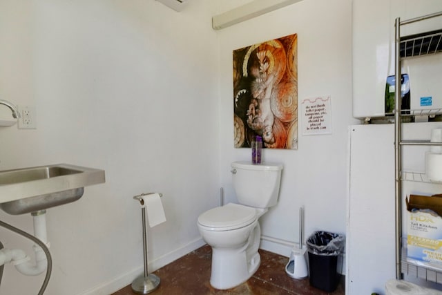 910 Sawyer Cove Rd, Hayesville, NC 28904 - bathroom with baseboards, toilet, and a sink
