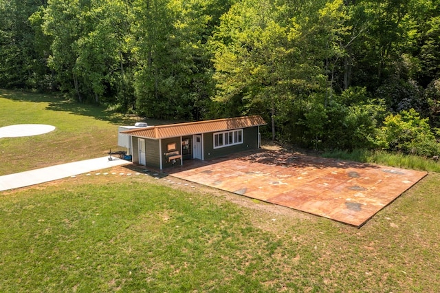 910 Sawyer Cove Rd, Hayesville, NC 28904 - view of front of property featuring a front yard, metal roof, and a view of trees