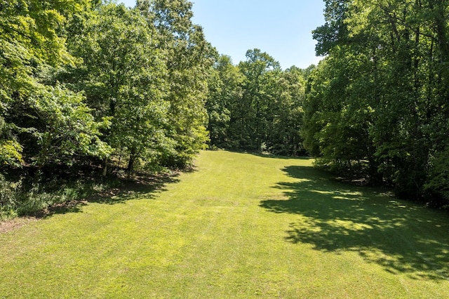 910 Sawyer Cove Rd, Hayesville, NC 28904 - view of green lawn featuring a wooded view