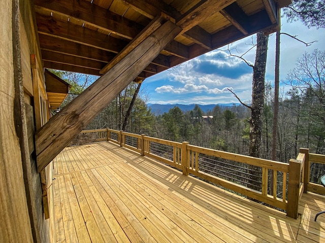 wooden terrace with a mountain view