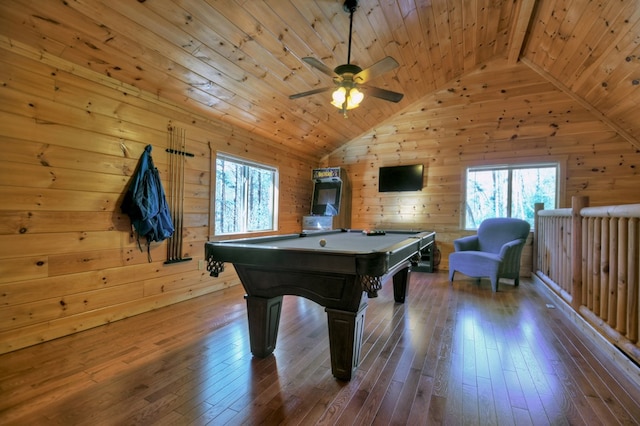 playroom with hardwood / wood-style flooring, a wealth of natural light, and vaulted ceiling