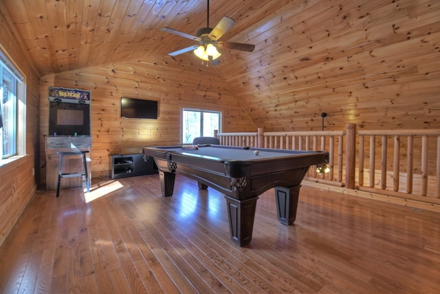 game room with wood walls, hardwood / wood-style floors, wooden ceiling, and vaulted ceiling