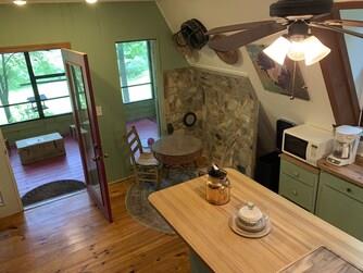 interior space featuring a healthy amount of sunlight, hardwood / wood-style flooring, and ceiling fan