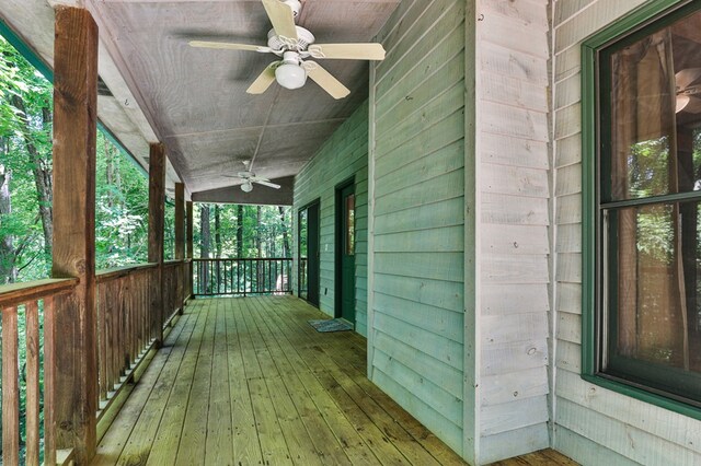 wooden deck with ceiling fan