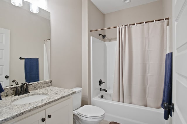 bathroom with shower / bath combination with curtain, vanity, and toilet