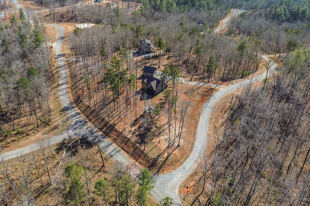 aerial view with a wooded view