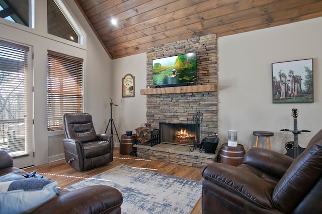 living room with high vaulted ceiling, a fireplace, wood finished floors, and wood ceiling