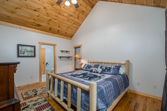 bedroom featuring hardwood / wood-style flooring, high vaulted ceiling, and wood ceiling