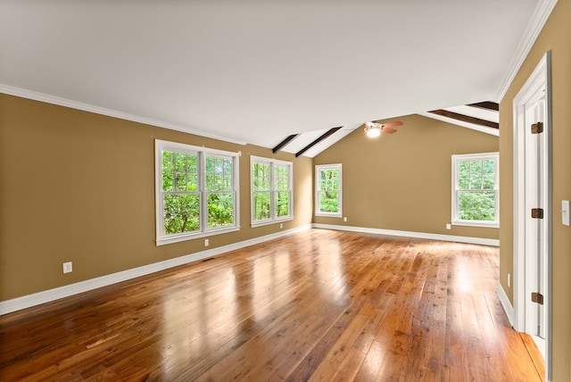 802 Old Mill Trl, Ball Ground, GA 30107 - spare room with light wood-style flooring, baseboards, lofted ceiling, crown molding, and a ceiling fan