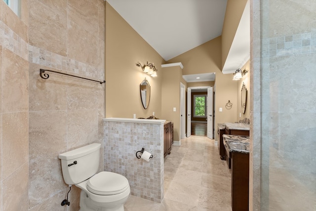 802 Old Mill Trl, Ball Ground, GA 30107 - full bathroom with vanity, tile walls, toilet, lofted ceiling, and crown molding