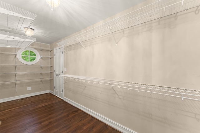 802 Old Mill Trl, Ball Ground, GA 30107 - spacious closet featuring wood finished floors