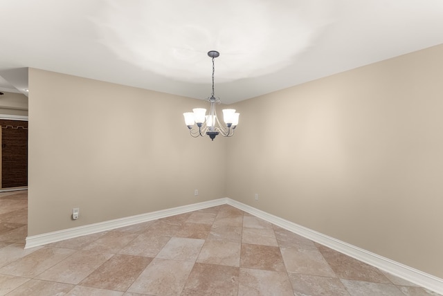 802 Old Mill Trl, Ball Ground, GA 30107 - empty room with baseboards, a chandelier, and light stone finish floors