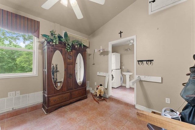 802 Old Mill Trl, Ball Ground, GA 30107 - entrance foyer with a ceiling fan, lofted ceiling, light tile patterned floors, and baseboards