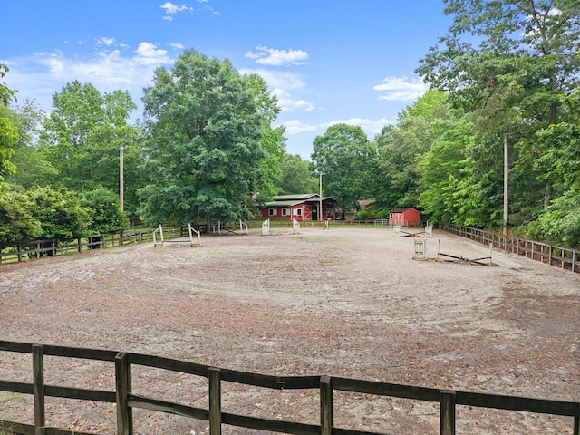 802 Old Mill Trl, Ball Ground, GA 30107 - view of yard with an enclosed riding area and an outbuilding