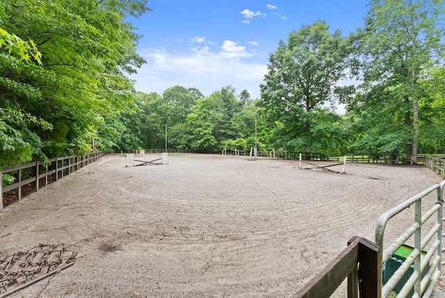 802 Old Mill Trl, Ball Ground, GA 30107 - view of yard featuring an enclosed riding area and a view of trees