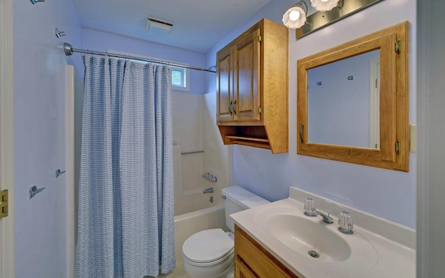 full bathroom with shower / bath combination with curtain, vanity, and toilet