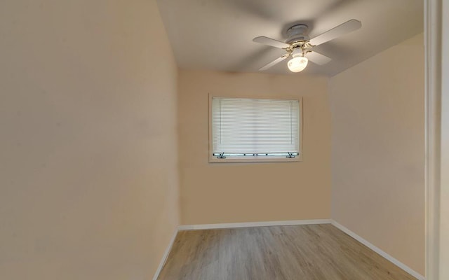 spare room featuring ceiling fan and light wood-type flooring