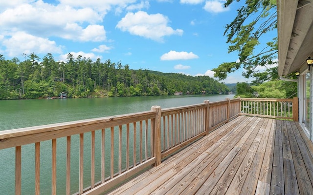 deck featuring a water view