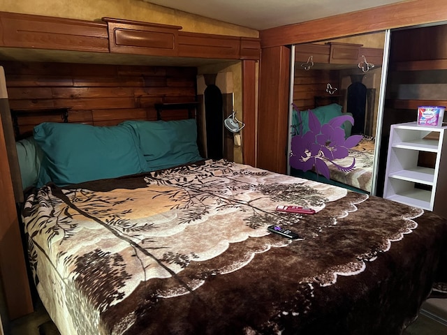 bedroom featuring a closet and vaulted ceiling