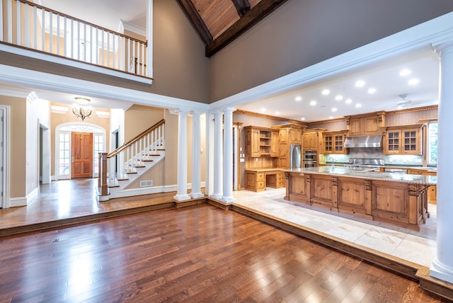 kitchen featuring light hardwood / wood-style floors, a kitchen island, and stainless steel appliances