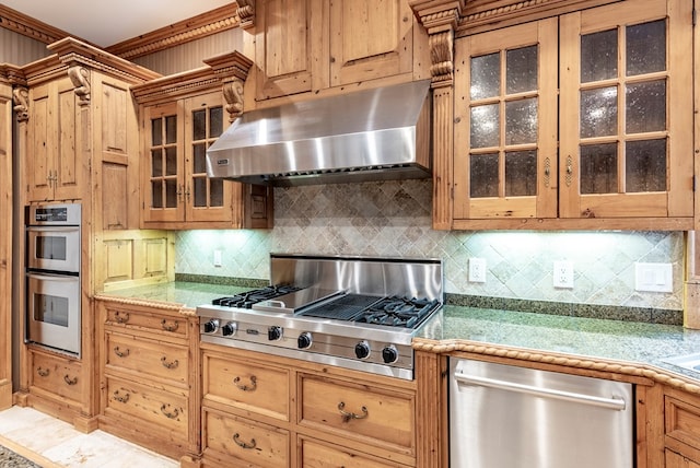 kitchen with decorative backsplash and stainless steel appliances