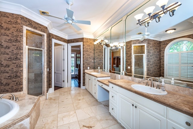 bathroom with ceiling fan with notable chandelier, shower with separate bathtub, and ornamental molding