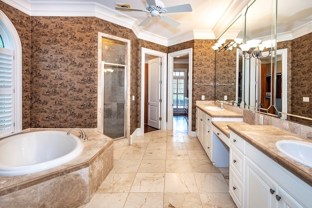 bathroom with ceiling fan with notable chandelier, vanity, separate shower and tub, and ornamental molding