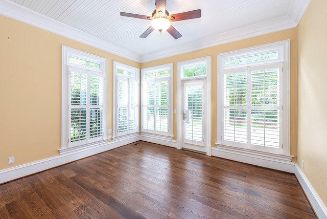 unfurnished sunroom featuring ceiling fan