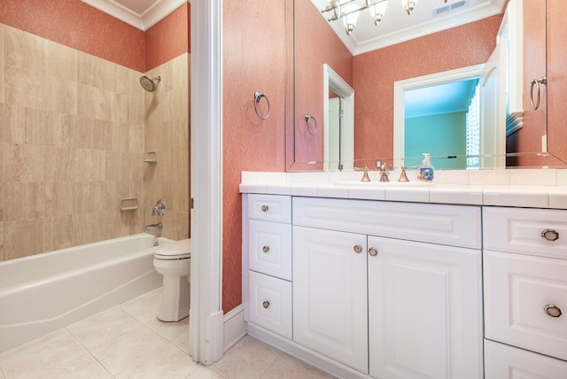 full bathroom with tile patterned flooring, toilet, tiled shower / bath, and crown molding