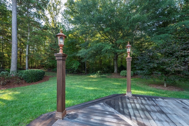 view of yard featuring a wooden deck