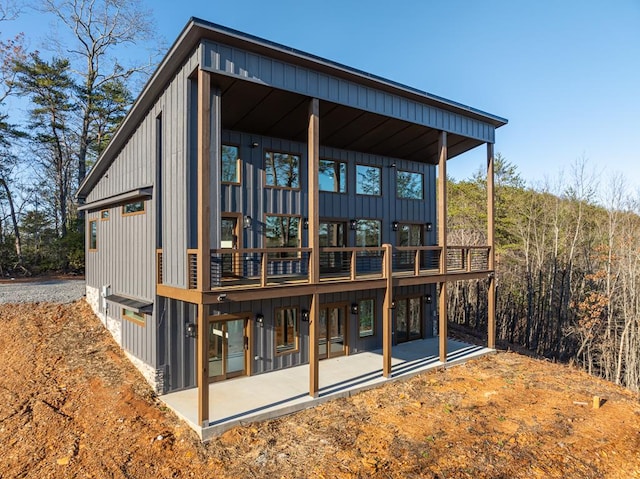 538 Mountain Laurel Rdg, Mineral Bluff, GA 30559 - back of house featuring a patio area, board and batten siding, and a deck