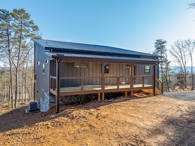 538 Mountain Laurel Rdg, Mineral Bluff, GA 30559 - rear view of house featuring central air condition unit, metal roof, and board and batten siding