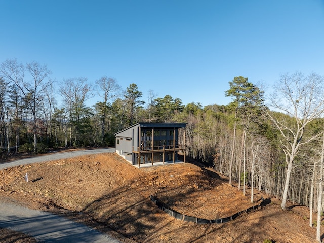 538 Mountain Laurel Rdg, Mineral Bluff, GA 30559 - view of front of house featuring a wooded view
