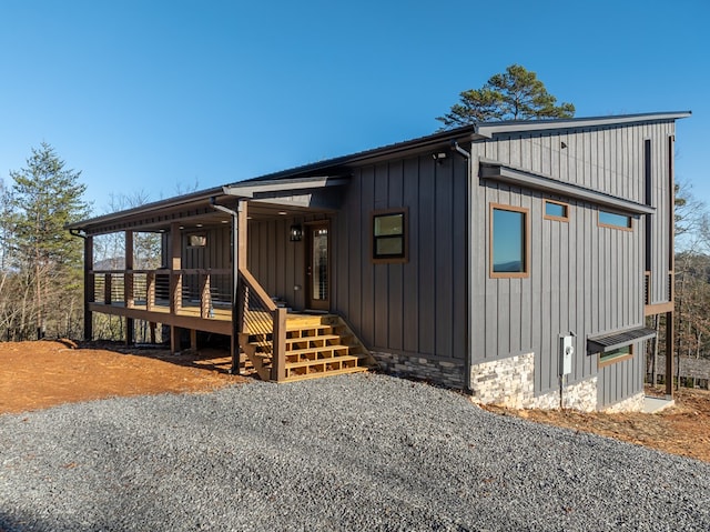 538 Mountain Laurel Rdg, Mineral Bluff, GA 30559 - view of front of home with board and batten siding and a deck