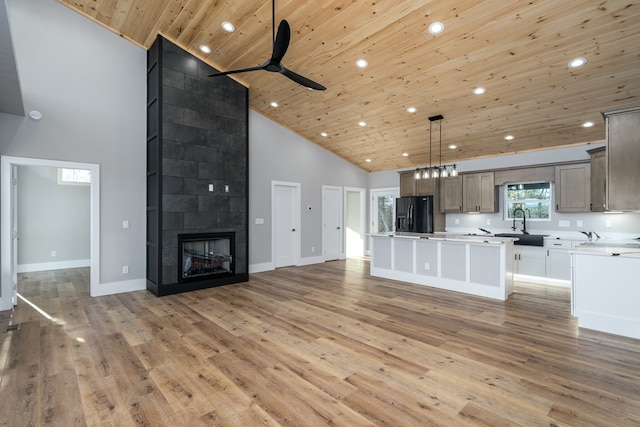 538 Mountain Laurel Rdg, Mineral Bluff, GA 30559 - unfurnished living room with high vaulted ceiling, wooden ceiling, a ceiling fan, light wood-style floors, and recessed lighting