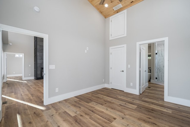 538 Mountain Laurel Rdg, Mineral Bluff, GA 30559 - empty room featuring high vaulted ceiling, wooden ceiling, wood finished floors, baseboards, and a smoke detector