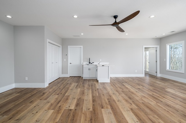 538 Mountain Laurel Rdg, Mineral Bluff, GA 30559 - unfurnished living room featuring a ceiling fan, light wood-style flooring, recessed lighting, and baseboards