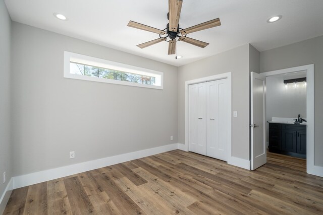 538 Mountain Laurel Rdg, Mineral Bluff, GA 30559 - unfurnished bedroom with wood finished floors, a closet, recessed lighting, baseboards, and a ceiling fan