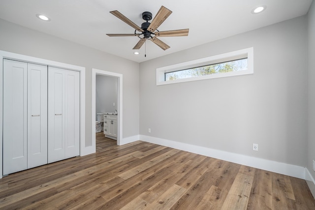 538 Mountain Laurel Rdg, Mineral Bluff, GA 30559 - unfurnished bedroom featuring wood finished floors, baseboards, a closet, recessed lighting, and ceiling fan