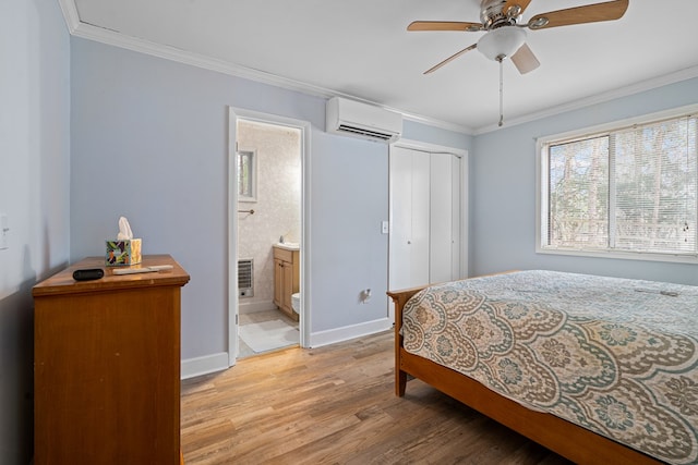 bedroom with ensuite bathroom, crown molding, a wall mounted air conditioner, and ceiling fan