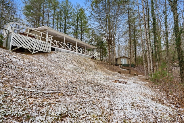 view of yard layered in snow