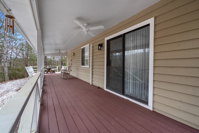 wooden terrace with ceiling fan