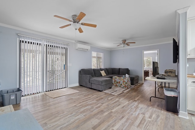 living room with crown molding, an AC wall unit, ceiling fan, and light hardwood / wood-style flooring