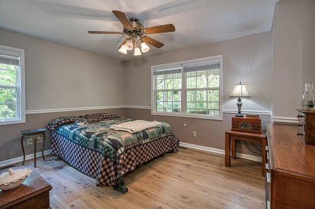 45 8 Point Trl, Blairsville, GA 30512 - bedroom featuring light wood-style floors, baseboards, multiple windows, and visible vents