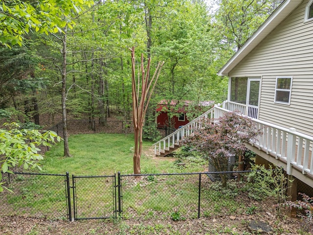45 8 Point Trl, Blairsville, GA 30512 - view of yard featuring fence, a deck, stairs, a gate, and a view of trees