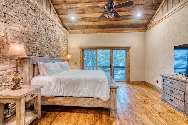 bedroom featuring vaulted ceiling, wooden ceiling, access to outside, a textured wall, and light wood-style flooring