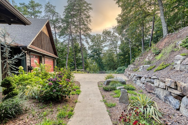 view of yard featuring a garage