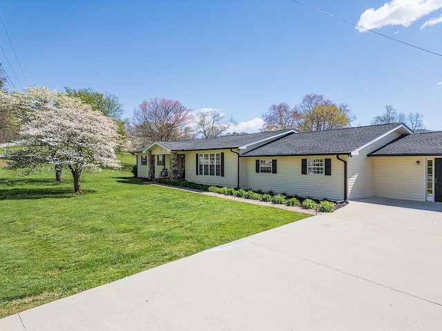 ranch-style house featuring a front yard