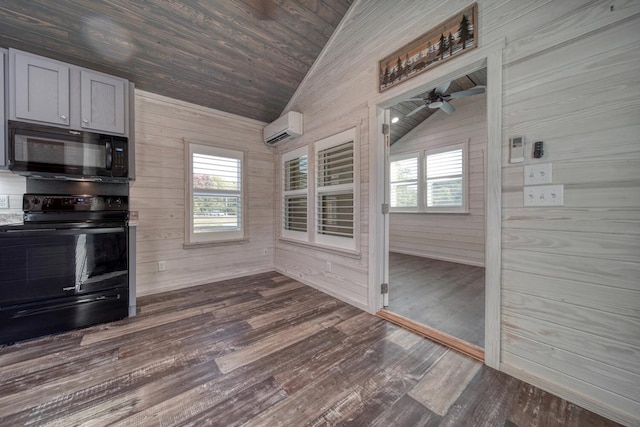 kitchen with ceiling fan, wooden walls, lofted ceiling, and black appliances