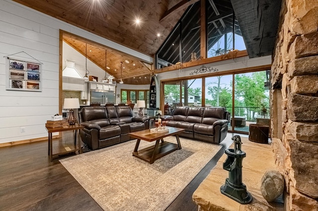 living room with wood ceiling, wood-type flooring, high vaulted ceiling, beamed ceiling, and wood walls